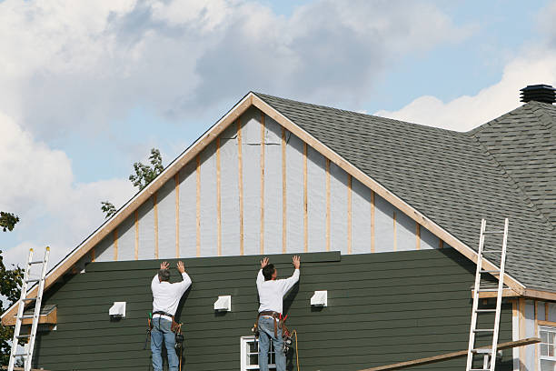 Professional Emergency Siding Repair technician working in Gill, CO